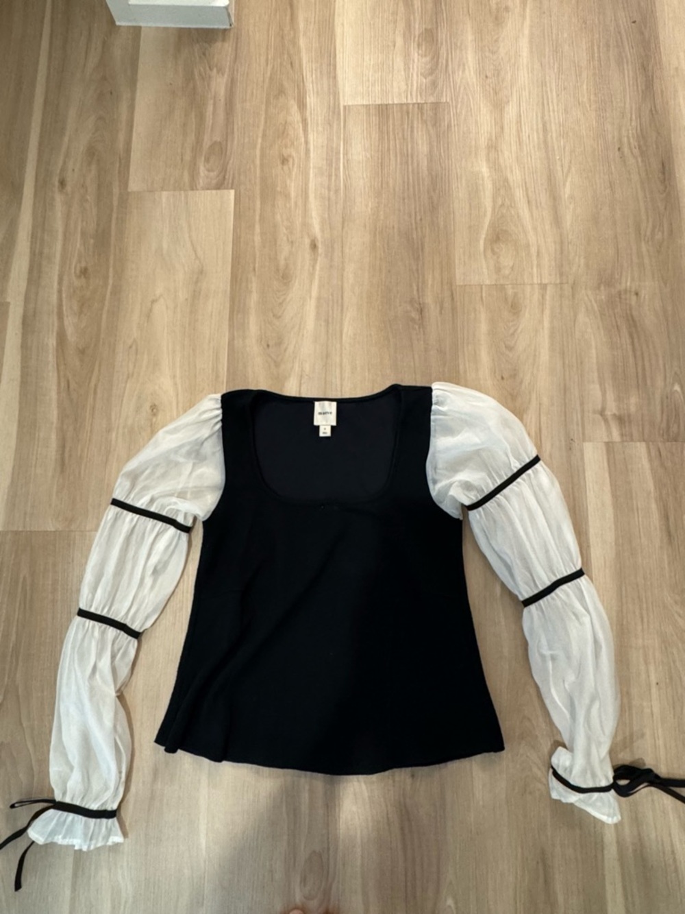 Maeve Black Top with White Sheer Puff Sleeves